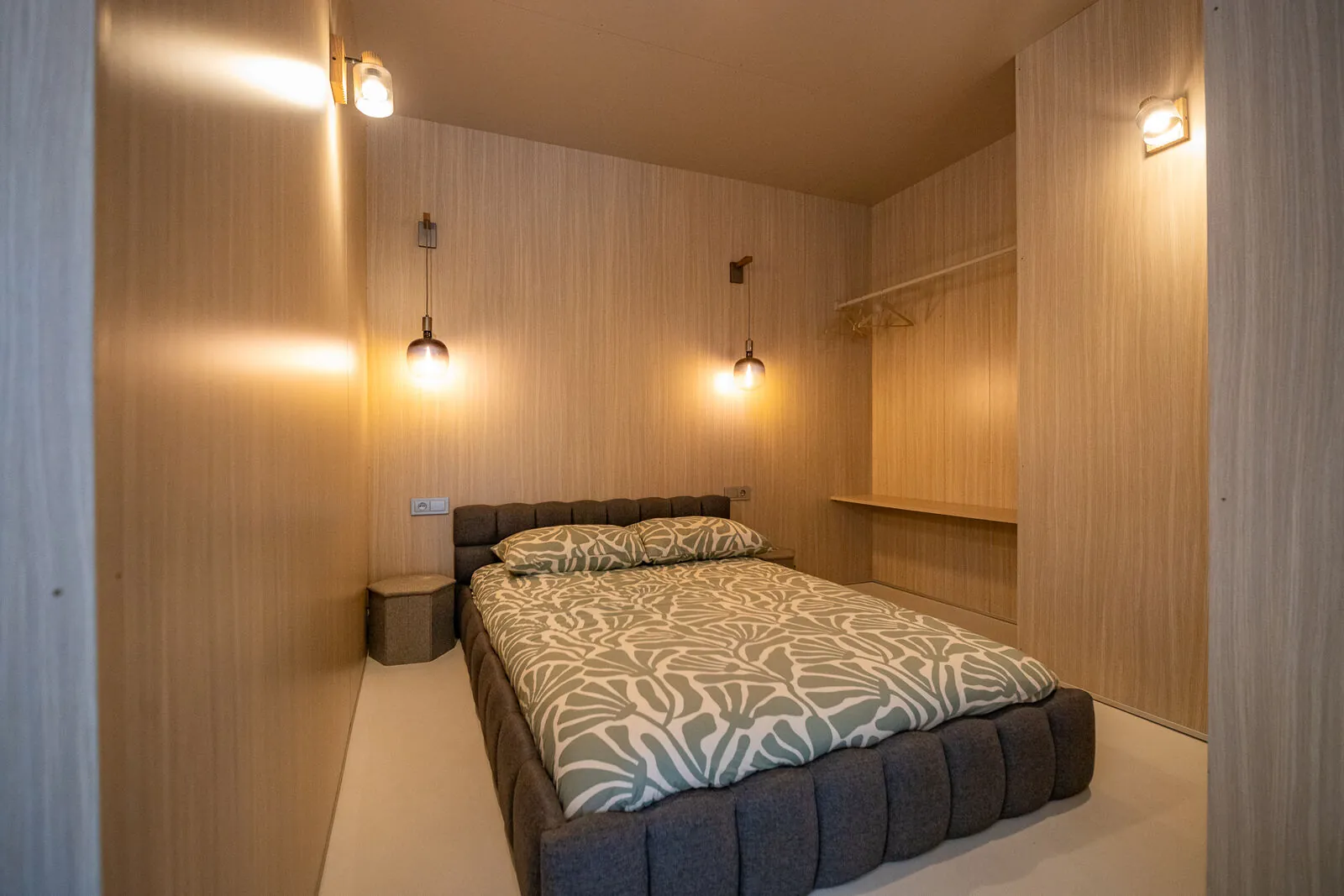 The main bedroom under the high ceiling